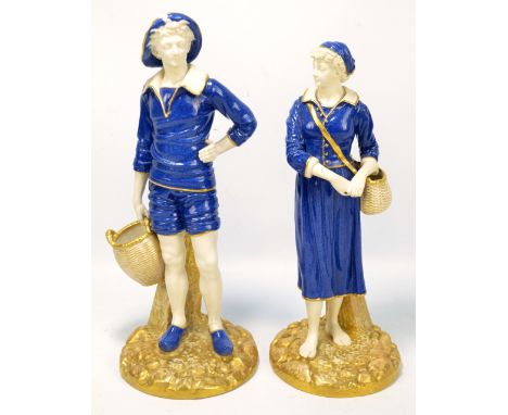 A pair of Royal Worcester porcelain powder blue glazed figures of 'French Fisher Girl' and 'French Fisher Boy' (af), marked i