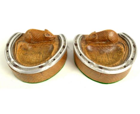 ROBERT 'MOUSEMAN' THOMPSON OF KILBURN; a commissioned pair of oak pin trays, each modelled as a horseshoe with pinned metal r