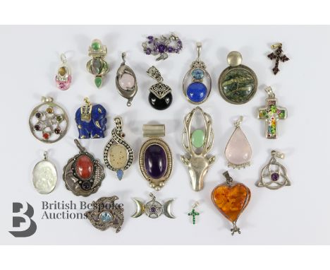 Quantity of semi-precious stone and silver pendants, including amethyst, lapis lazuli, mother of pearl, some with both Buddhi