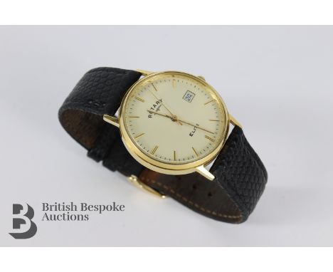 Gentleman's 18ct yellow gold Rotary 'Elite' 2005 wrist watch. The watch having champagne face with baton dial, with date aper