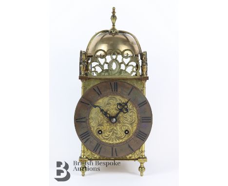 Astral Coventry, early 20th century brass lantern clock, in the 17th century manner, pierced frets over a Roman chapter ring,