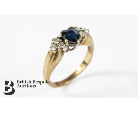 9ct sapphire and diamond ring, set with a heart-shaped sapphire approx 5mm, set with 14 pts of dias, size K+ , approx 2.84 gm