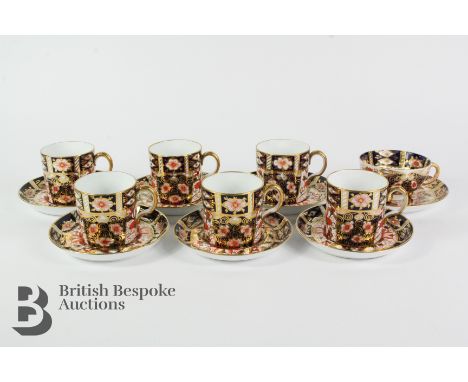 Crown Derby Imari demi-tasse, comprising six cups and saucers and one Imari pattern Davenport tea cup and saucer.&nbsp;