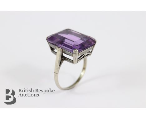 Art Deco period silver and amethyst dress ring, size P. The amethyst measures approx 18 x 14mm, approx 6.3 gms.&nbsp;