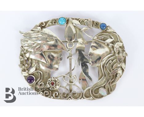 Sheana M. Stephen (Scottish) silver brooch, depicting the young lover's Deirdre and Naisi, crafted in silver and heightened w