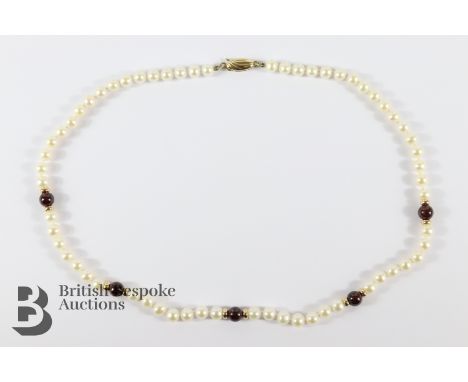 9ct gold cultured pearl and garnet necklace, approx 43 cms in length, in the original Just Gems box. 
