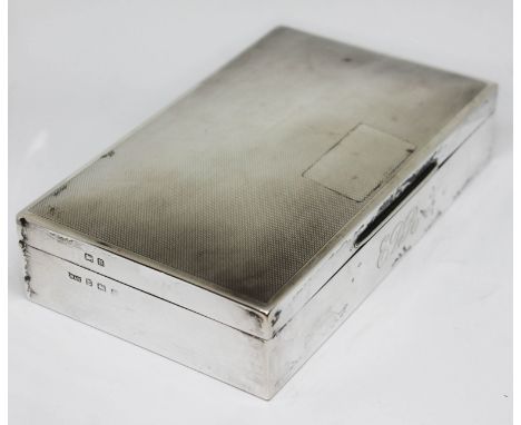 A hallmarked silver cigarette case, length 15cm.  