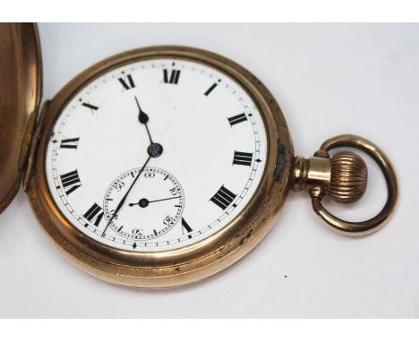 An early 20th century gold plated full hunter pocket watch, the unsigned white enamel dial having Roman numerals, spade hands