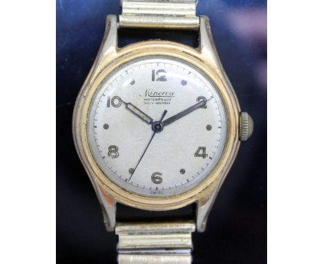 A vintage WWII era Minerva gold plated wristwatch, the signed natural patinated dial having alternate hour dots and Arabic nu