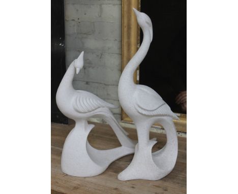 A pair of vanguard accents stylised ceramic figures, heights 49cm and 63cm.&nbsp;Condition - both cork bases split, otherwise