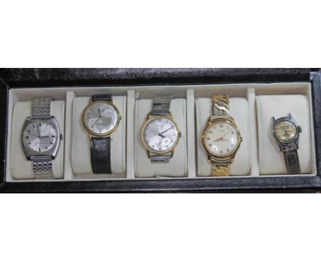 A collection of five vintage mechanical wristwatches in a watch display case comprising of a Timex Hopalong Cassidy as found,