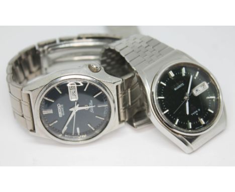 Two vintage 1970s stainless steel Seiko quartz JDM Kanji wristwatches comprising a SilverWave 7546-8340 and a Type II 7546-80