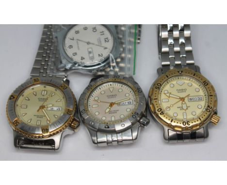 Four Casio JDM Kanji wristwatches comprising three stainless steel mid sized divers style quartz day date wristwatches on ori