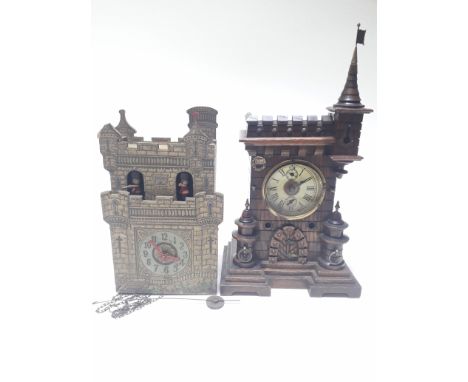 Two novelty wall clocks formed as castles, one marked Paico England.&nbsp;Condition - good, general wear only, each clock app