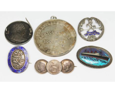 Assorted brooches/medals comprising a George III 1817 half crown brooch, a Queens Own Royal West Kent brooch marked Sterling,