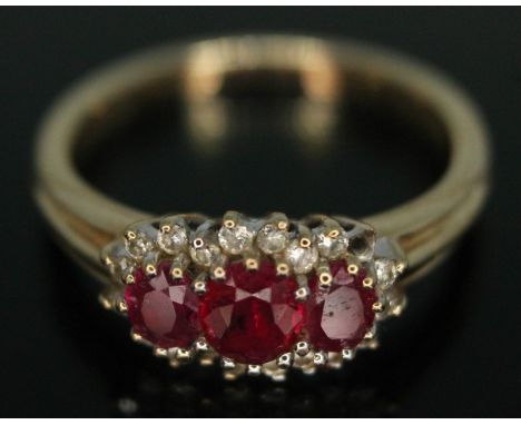 A hallmarked 9ct gold ruby and diamond ring, gross wt. 2.55g, size L/M.  