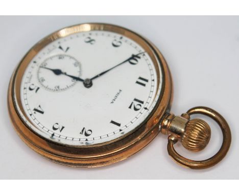 A Prima gold plated pocket watch, the signed white enamel dial having Arabic numerals, spade hands and seconds subsidiary dia