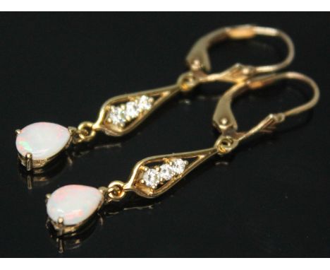 A pair of pear opal and diamond drop earrings, marked 375, length 41mm, gross wt. 2.25g.&nbsp;Condition - good, no damage/rep