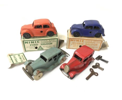 Triang Minic Morris Saloon and Ford Saloon, plastic clockwork models, length 8.5cm (both G in F boxes). Together with Triang 
