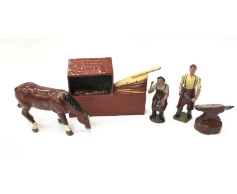 Britains Blacksmith and Anvil (G/VG). Together with Johillco Blacksmith's Forge, Blacksmith (both G/VG) and a lead horse (F).