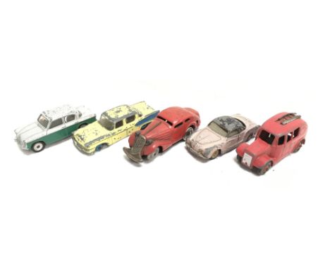 Schuco (Germany) tinplate clockwork car, length 11cm (G/F). Together with four Dinky models including 25h Streamlined Fire En
