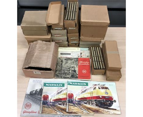 Quantity of 1950's Marklin track and controllers: 3 x pair of points; 3 x double slips; 6 x 10 straights; 3 x 10 curves; 4 x 