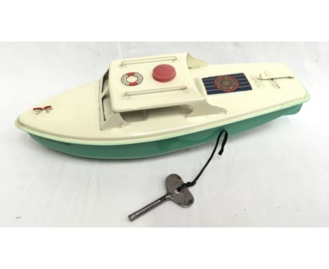 Sutcliffe Model (England) Sprite tinplate clockwork Speedboat, turquoise hull, cream deck. Length 25cm. VG condition with key