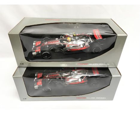 Two Minichamps 1/18 scale Vodafone McLaren Mercedes F1 Racing Cars: MP4-22 L. Hamilton 2007; MP4-22 F. Alonso 2007. M and box