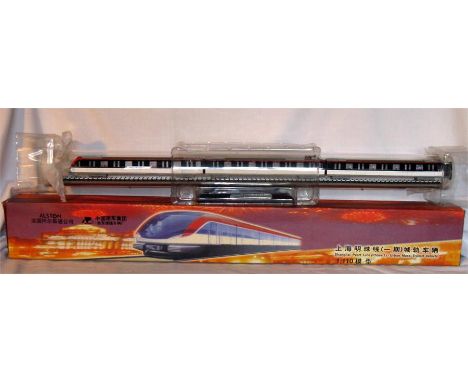 A Desk Display Model of an Alstom Shanghai Pearl Line 3 Car Urban Mass Transit 3 Car Unit on Track in a Perspex cylinder moun