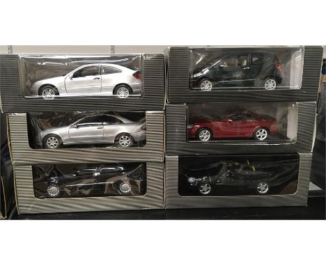 Six 1/18 scale Mercedes diecast models. Appear E/M and boxed. 