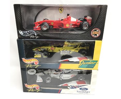 Three Hot Wheels Racing 1/18 scale Formula 1 Racing Cars: Stewart SF2 - Rubens Barrichello; Jordan Mugen Honda 199 Launch Ver