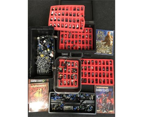 Quantity of Games Workshop wargaming figures, includes approx. 100 Lord of the Rings plastic/ metal figures with book (mostly