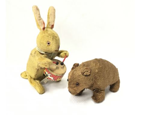Masudaya (Japan) Mechanical Bear: tinplate flock-covered bear, length 14cm. Together with a mechanical rabbit playing the dru