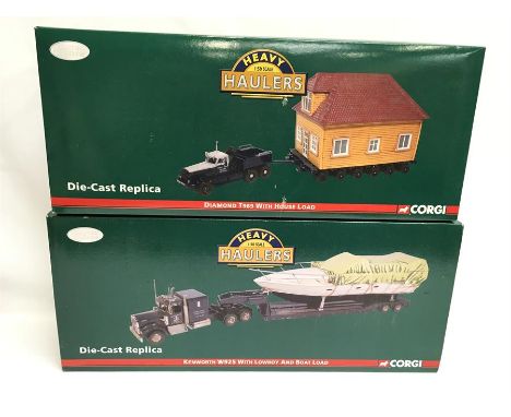 Two Corgi Heavy Haulers 1/50 scale models: US55109 Diamond T989 with House Load; US55709 Kenworth W925 with Lowboy and Boat L