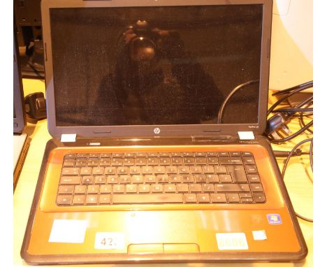 HP Pavilion G Series laptop with charger. P&P Group 2 (£18+VAT for the first lot and £3+VAT for subsequent lots) Condition Re
