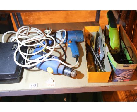 Four electrical items including two drills, cordless trimmer and a selection of drill bits. Not available for in-house P&P, c