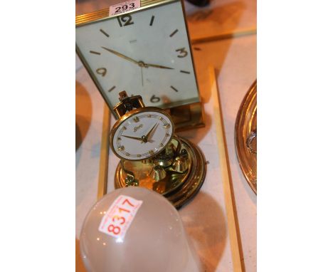 Two retro clocks including a Swiza 8 day mantel clock. Not available for in-house P&amp;P, contact Paul O'Hea at Mailboxes on