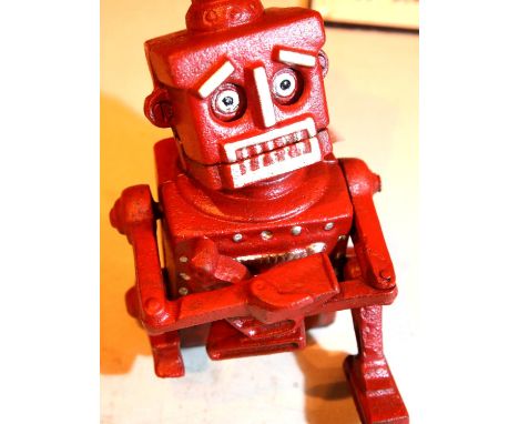 Cast iron sad robot moneybox, H: 17 cm. P&amp;P Group 1 (£14+VAT for the first lot and £1+VAT for subsequent lots) 