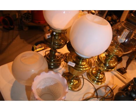 Four electrically fitted oil lamps with shades and two extra glass shades. Not available for in-house P&P, contact Paul O'Hea