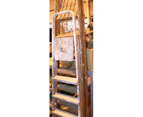 Seven tread wooden step ladder and five tread aluminium decorative step ladder. Not available for in-house P&amp;P, contact P