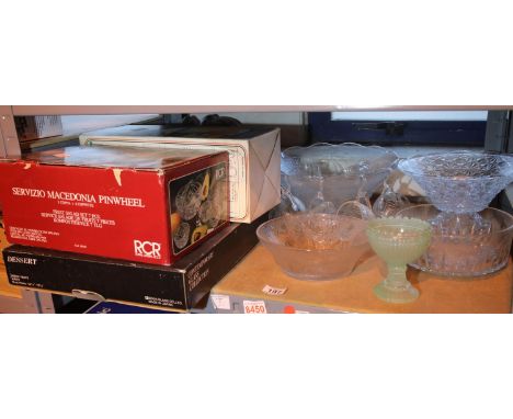 Shelf of mixed glassware including twelve piece punch bowl set and a boxed pump hot/cold beverage dispenser. Not available fo