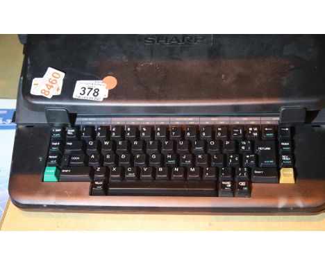 Sharp portable electric typewriter model PA-3100S. Not available for in-house P&amp;P, contact Paul O'Hea at Mailboxes on 019