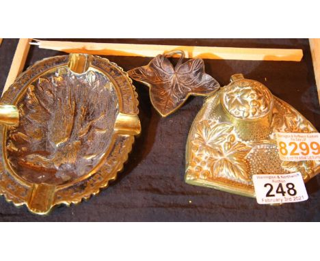 Large antique brass lidded inkwell with well and a similar ashtray and a brass leaf. P&amp;P Group 1 (£14+VAT for the first l