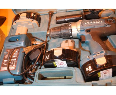 Makita 18v battery drill with three batteries and charger. Not available for in-house P&P, contact Paul O'Hea at Mailboxes on