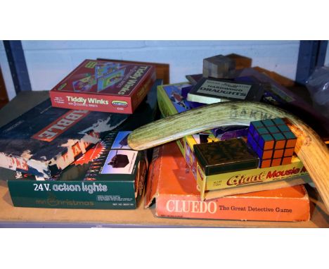 Shelf of mixed games and unused set of LV Christmas chaser lights. Not available for in-house P&amp;P, contact Paul O'Hea at 