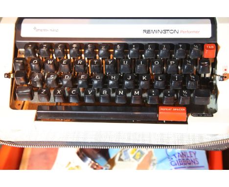 Cased Sperry Rand Remington Performer portable typewriter. Not available for in-house P&amp;P, contact Paul O'Hea at Mailboxe