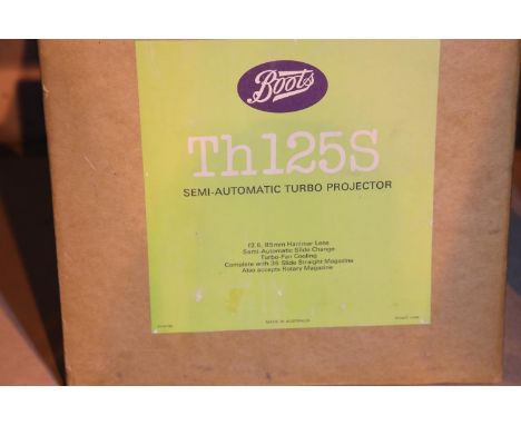 Boots semi automatic turbo slide projector with original box. Not available for in-house P&P, contact Paul O'Hea at Mailboxes