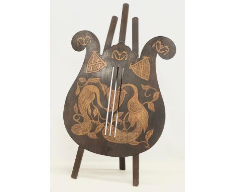 An early 20th century firescreen with Pokerwork decoration. Circa 1900-1910. 54.5x89cm 