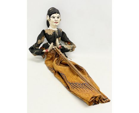 An early 20th century Javanese rod puppet. 59cm. 