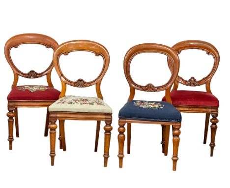 A set of 4 Victorian balloon back chairs with tapestry seats. 